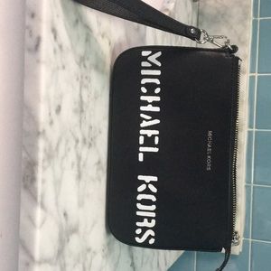 Never used Micheal Kors clutch/wristlet